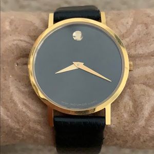 Authentic Movado watch in gold, black leather band